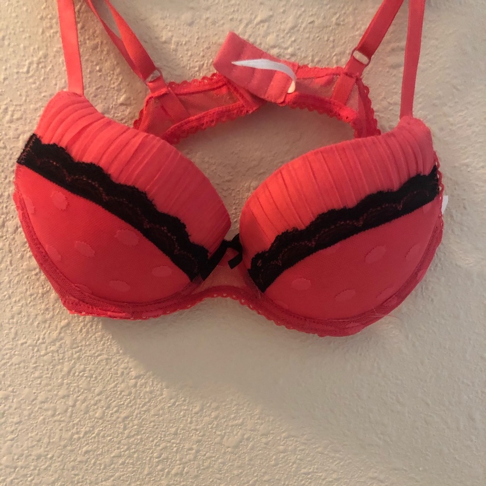 Never worn, coral bra